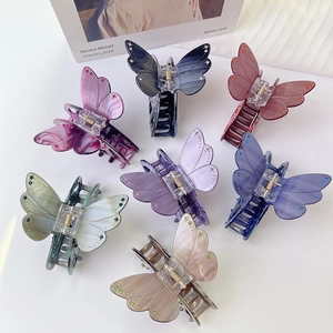 Pinces à cheveux papillon en acétate coloré avec strass dans divers tons élégants