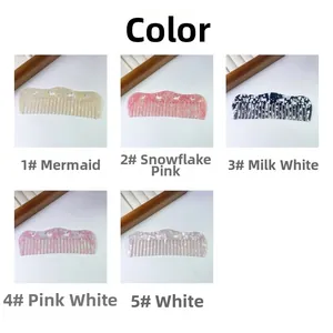 Detail of diverse acetate hair combs with hollow heart patterns and wave edges