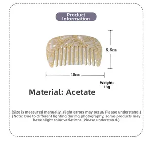 Detail view of acetate wide-tooth comb with dimensions 10x5.5cm and marble pattern