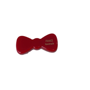 Fermaglio per capelli a fiocco in acetato rosso con scritta dorata France Handmade