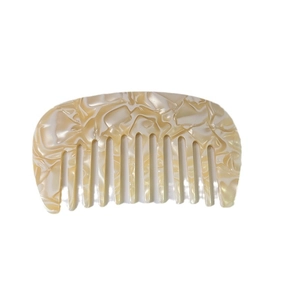 Minimalist wide-tooth marble acetate hair comb for detangling curly hair