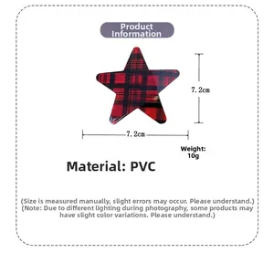Vista detallada de una pinza para el pelo de estrella de cuadros rojos de 7,2 cm en PVC