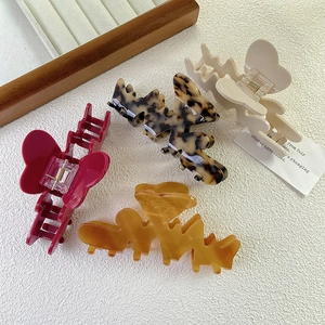 Set di quattro mollette per capelli in acetato a cuore bordeaux, tartaruga, ambra e beige