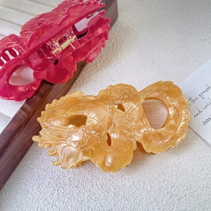 Elegant Chinese dragon hair claw clips in red and amber gold acetate for women
