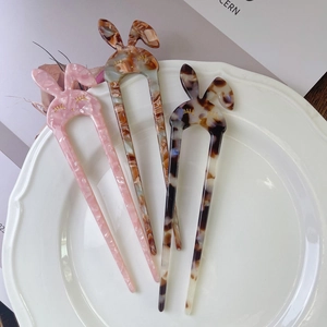 Minimalist rabbit ear acetate U-shaped hair fork in marble and tortoiseshell patterns