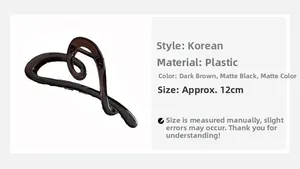 Detail view of 12cm irregular heart claw clips in dark brown, matte black, and tortoiseshell