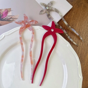 Épingle à cheveux étoile de mer en acétate avec strass et design ondulé en U