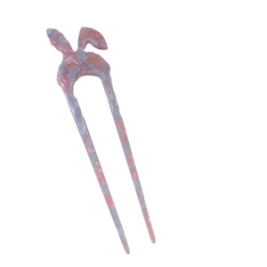 Pink acetate rabbit hair stick with gold bunny ears and marble texture for buns