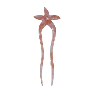 Pic à cheveux étoile de mer en acétate marbré rose avec incrustation de strass