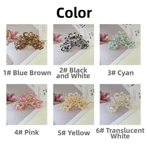 Detail view showing six elegant colors of acetate flower hair claws with rhinestone accents