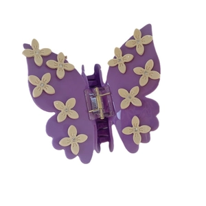 Elegant purple butterfly hair claw clip with 3D white flowers and sparkling rhinestones