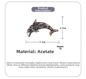 Détail de la pince à cheveux dauphin en acétate écaille de tortue avec les dimensions