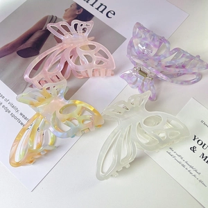 Elegant hollow butterfly acetate hair claw clips in four colorful patterns for women