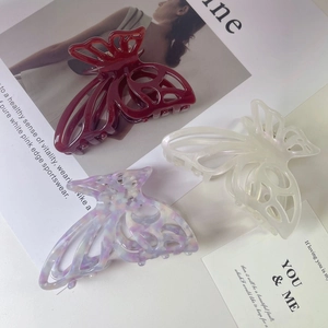 Three-piece set of elegant hollow butterfly acetate hair claws in red, white and purple