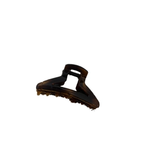 Minimalist tortoiseshell claw clip in deep amber matte finish for women hair styling