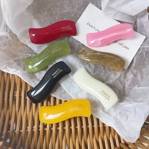 Colorful wavy candy-colored hairpins with France Handmade gold text on woven basket