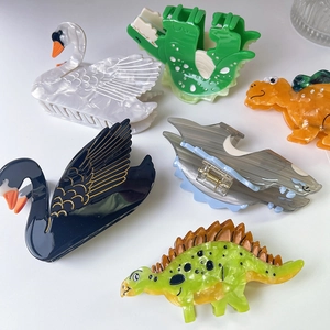 Barrettes à cheveux en acétate aux motifs de cygnes et de dinosaures marbrés