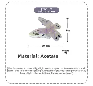 Detailed view of large butterfly hair claw clip showing acetate material and 10.3cm dimensions