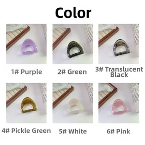 Detail showcasing six colors of thick hollow hair claw clips on lifestyle background