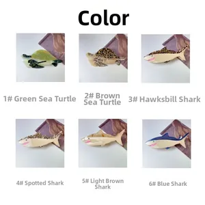 Detailed grid showing acetate hair claws in turtle and shark shapes with varied colors