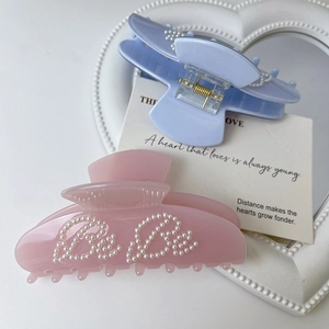 Elegant ballet style matte pink and blue hair claws with pearl letter designs