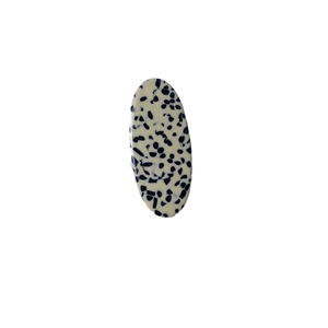 Polished acetate hair clip with classic dalmatian pattern and smooth glossy finish