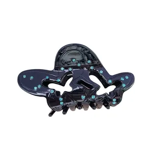 Creative butterfly-shaped acetate hair claw with sparkling blue rhinestones for women