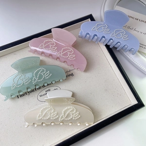 Elegant large ballet style acetate hair claws with BeBe pearl inlay in four pastel colors