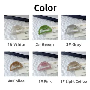 Détail des pinces à cheveux ajourées en blanc, vert, gris, café, rose et couleur café clair