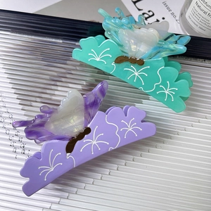 Creative purple and green butterfly claw clips in premium acetate for stylish hairstyling