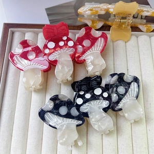 Mushroom acetate hair claw clips with red polka dots and bow design for women