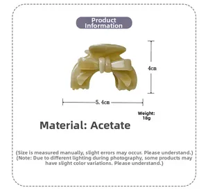 Détails de la pince à cheveux noeud en acétate crème, taille 5,4 cm et poids de 18 g