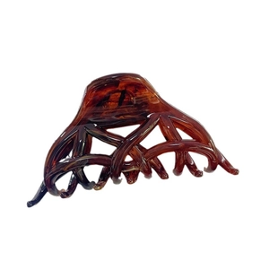 Elegant French vintage amber acetate claw clip with a stylish woven mesh texture for women