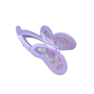 Elegant purple butterfly hair claw clip with acetate texture and metallic spring