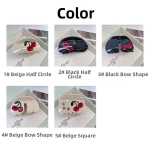 Close-up of cherry pattern acetate hair claws in various shapes and colors