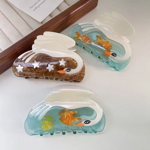 Creative swan shaped acetate hair claw clips with star and fish accents in mixed colors