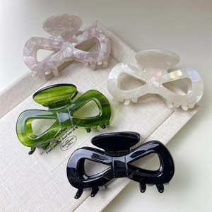 French vintage bow hair claw clips in marble pink, pearl white, green and black acetate