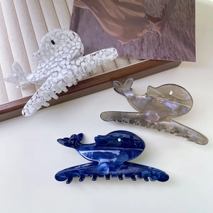 3D ocean whale hair claw clips in acetic acid with marbled white and navy blue finishes