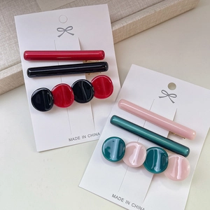 Ensemble de pinces à cheveux en résine d'acétate aux tons rouge, noir, rose et vert