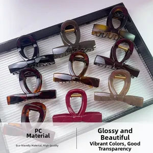 Detailed macro view of butterfly bow hair clips made of high-quality polished PC material