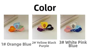 Detailed views of acetate butterfly hair claws with rhinestones in three color variants