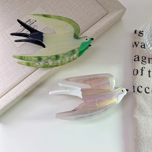 Elegant swallow bird hair claw clips in colorful acetate material for women's hair styling
