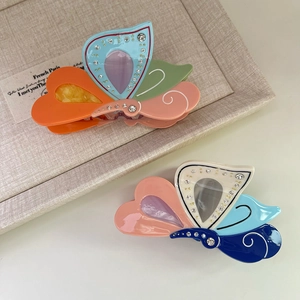 Elegant butterfly hair claw clips with colorful acetate and sparkling rhinestones for women