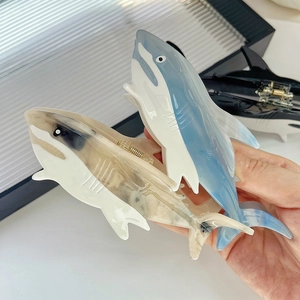 Three-piece set of shark-shaped acetate hair claws in blue, beige, and black colors