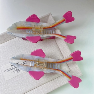 Tropical fish hair claw set with marble texture and vibrant pink accents for women