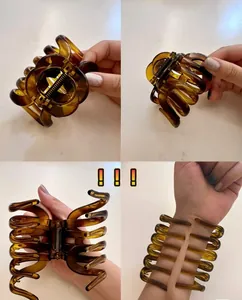 Grande molletta per capelli in resina ambrata per capelli folti con presa a denti multipli