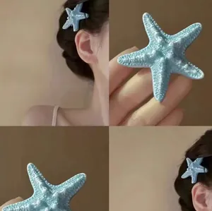 Vue détaillée de la pince à cheveux étoile de mer bleu clair avec des textures réalistes