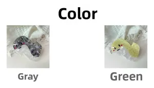 Dettaglio di fermagli per capelli in acetato a forma di serpente cartoon grigio e verde