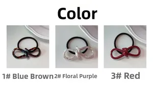 Three variants of 5mm thick bow hair ties in blue-brown, floral purple, and red styles
