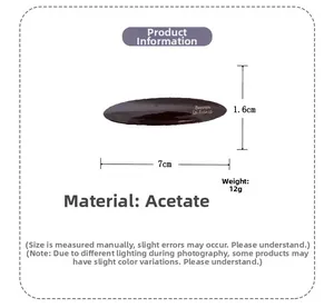 Detail view of oval acetate hair clip in dark coffee color with 7cm size dimensions